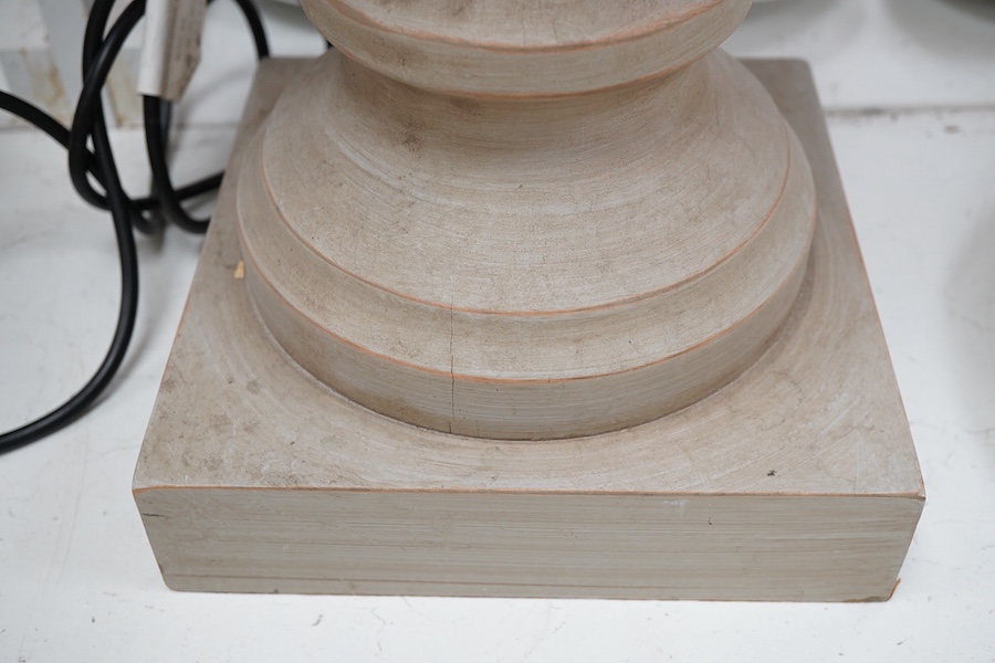 A pair of painted and carved wood lamps, 65cm to wood top